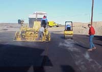 Paving a 2 inch AC/SEAM overlay in California